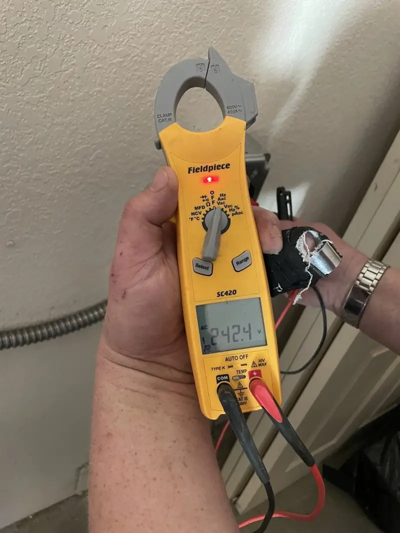 Voltage testing with clamp meter during Whole House Surge Protector in Lower Frederick